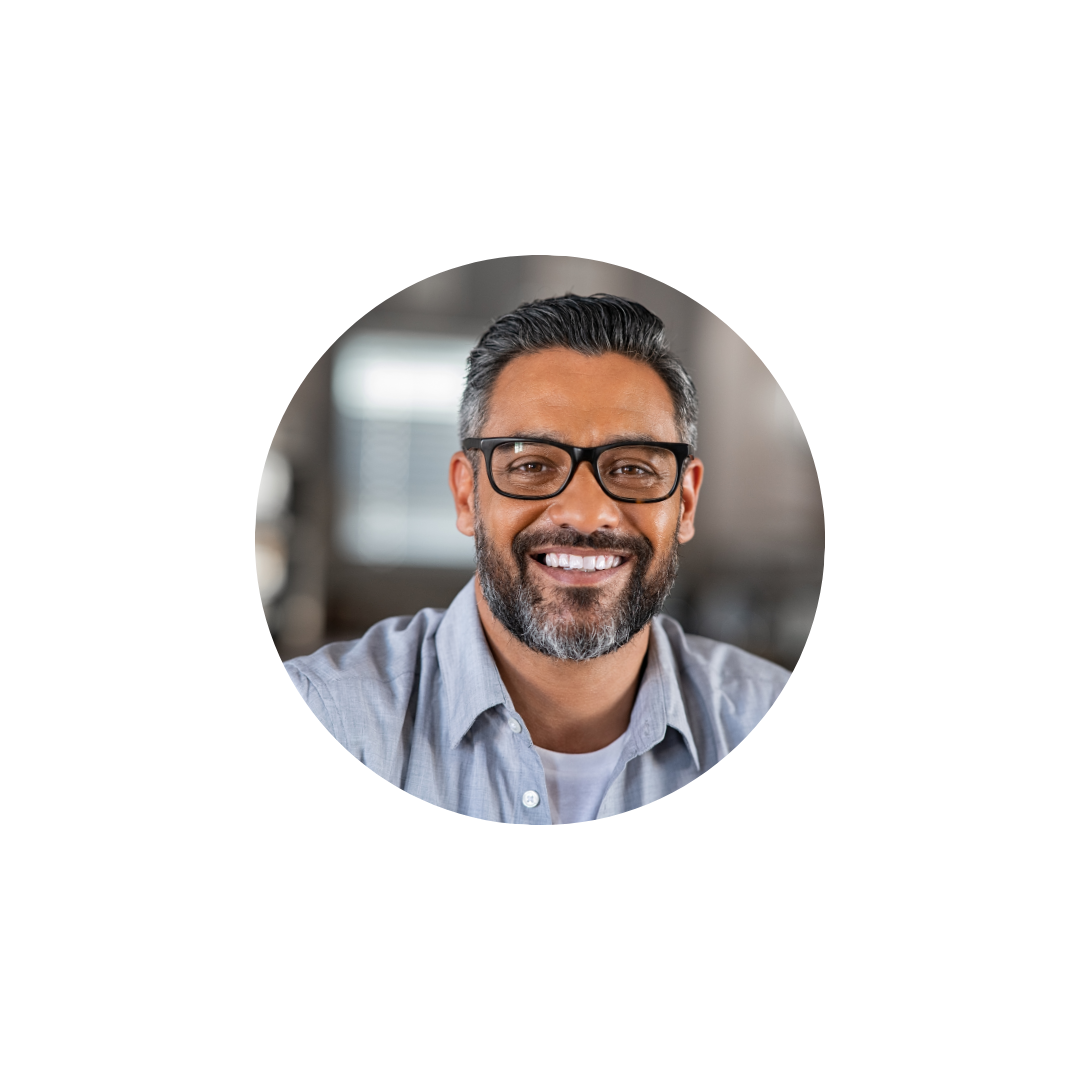 Middle-aged man smiling after successful nose surgery by Dr Swetal Mahajan in Chembur.